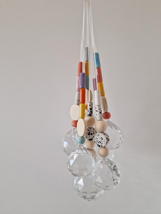 Orvokki Suncatcher | verschiedene Farben Aufgeweckt