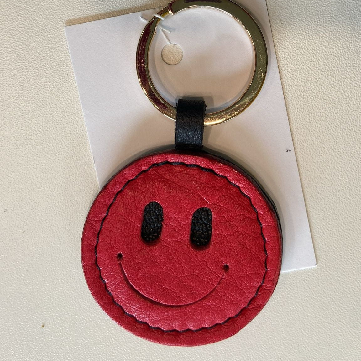 Petit Mai Smiley Schlüsselanhänger – verschiedene Farben Aufgeweckt