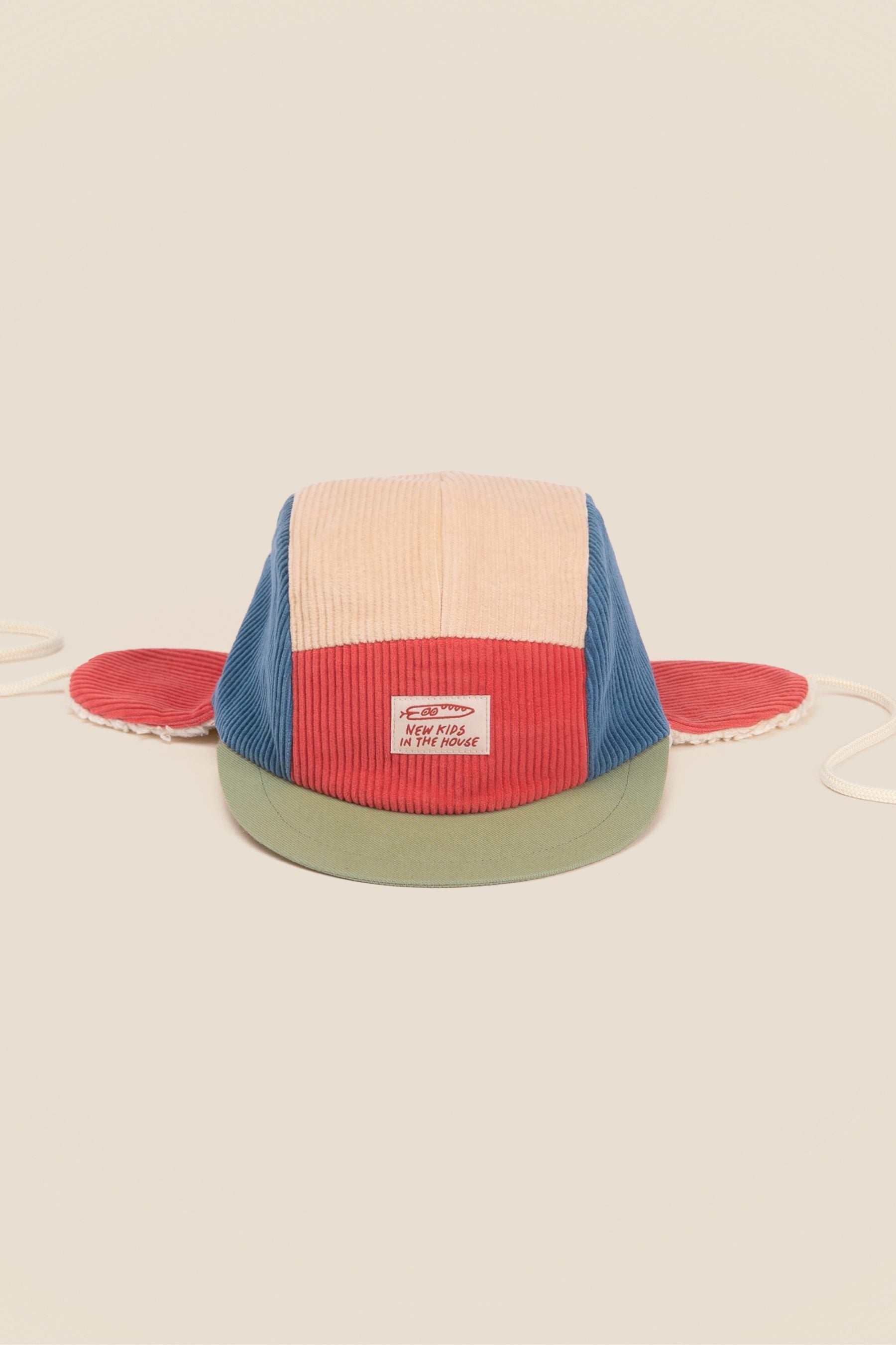 New Kids in the House Robin Dakota – Winter Cap (Cord) Aufgeweckt