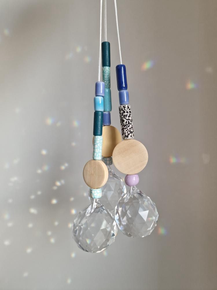 Orvokki Suncatcher | verschiedene Farben Aufgeweckt