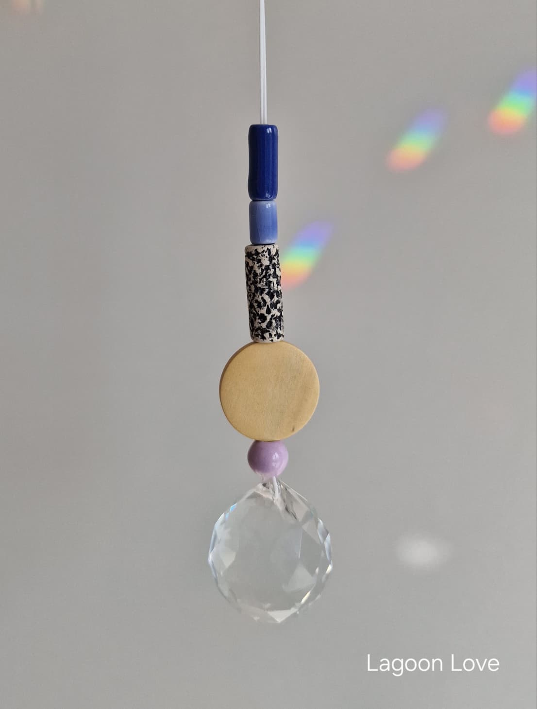 Orvokki Suncatcher | verschiedene Farben Aufgeweckt