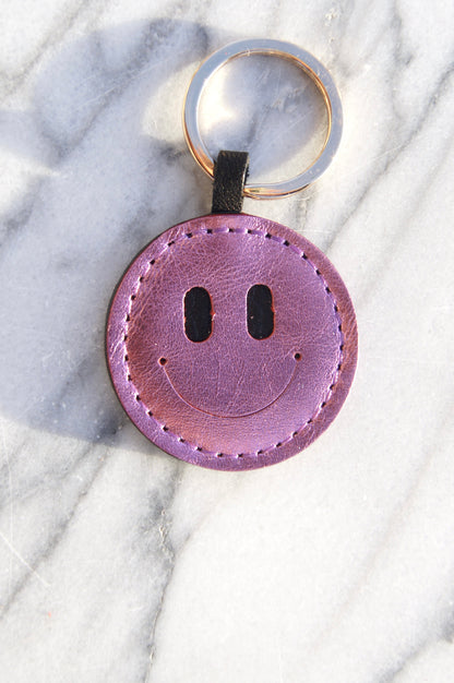 Petit Mai Smiley Schlüsselanhänger Aufgeweckt