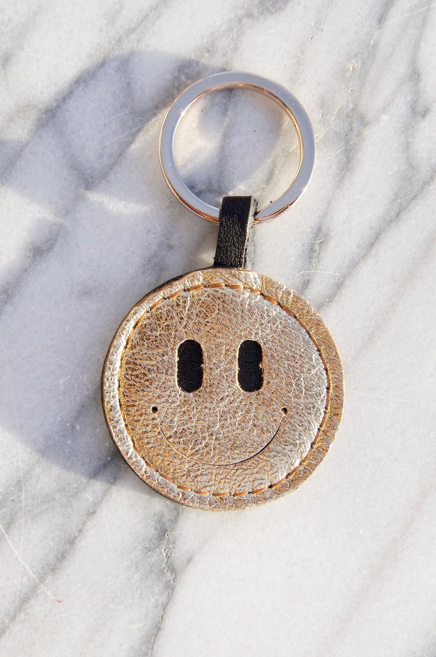 Petit Mai Smiley Schlüsselanhänger Aufgeweckt