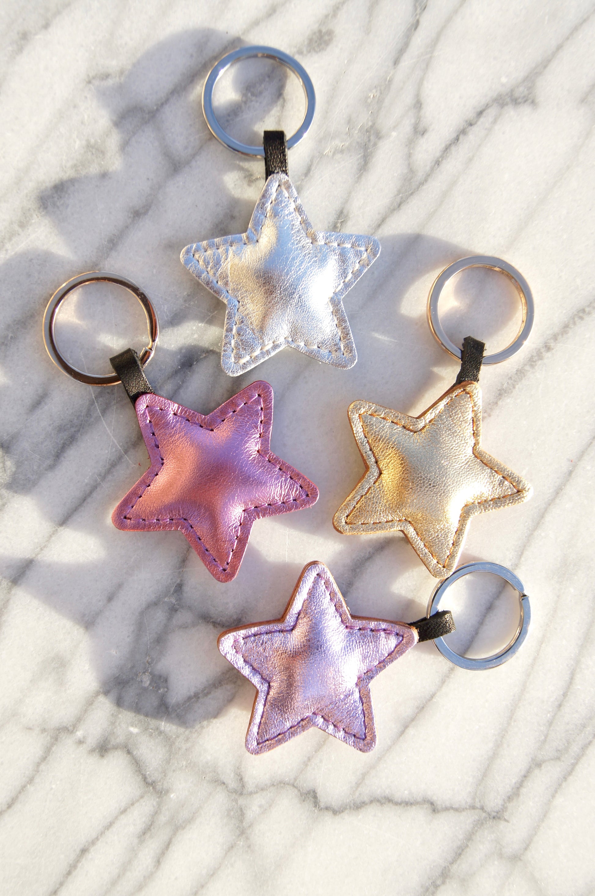 Petit Mai Stern Schlüsselanhänger Aufgeweckt