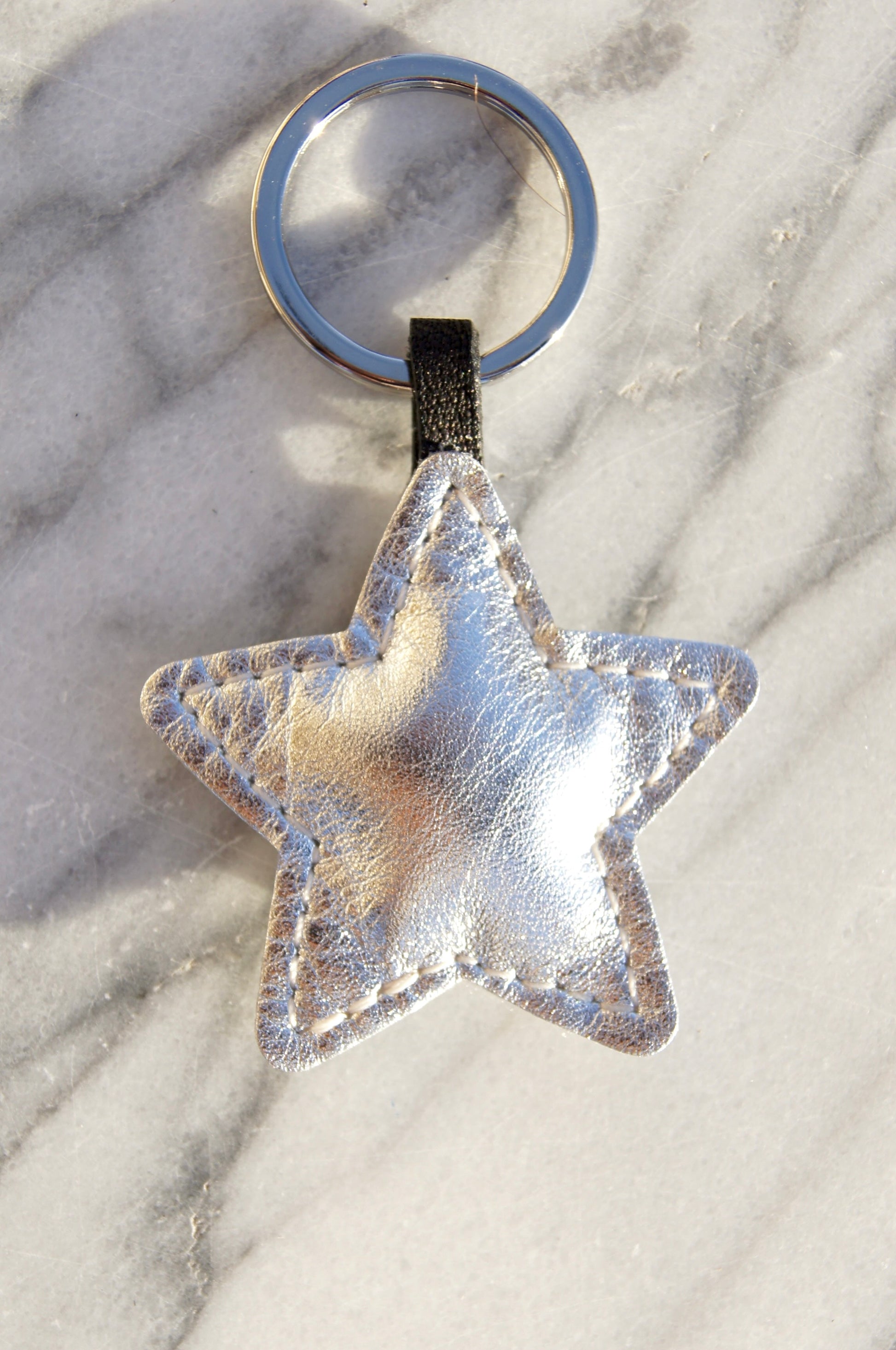 Petit Mai Stern Schlüsselanhänger Aufgeweckt