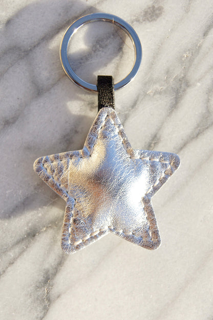 Petit Mai Stern Schlüsselanhänger Aufgeweckt