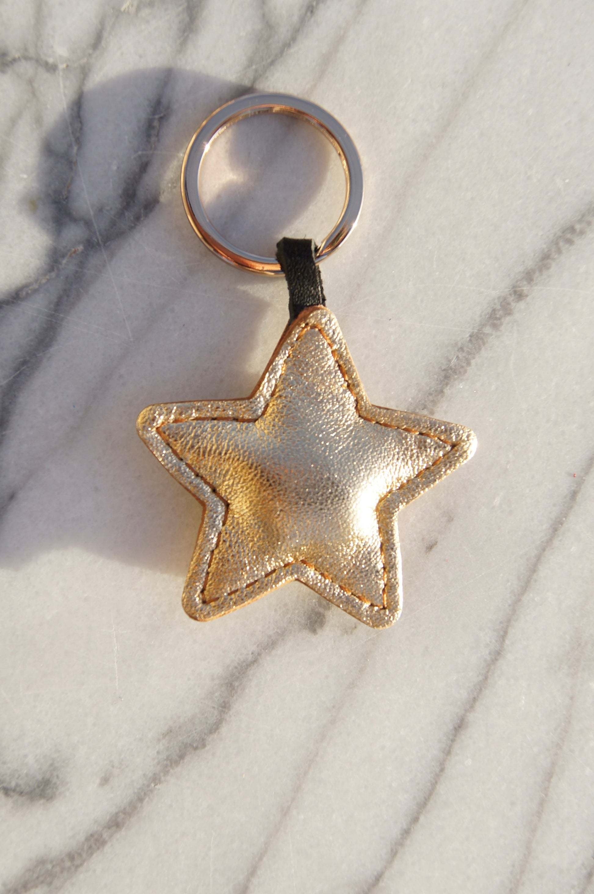 Petit Mai Stern Schlüsselanhänger Aufgeweckt