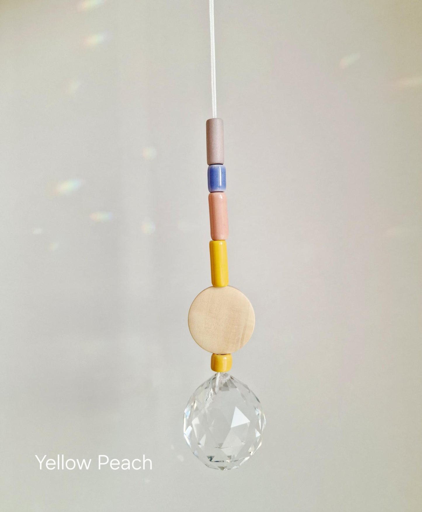 Orvokki Suncatcher | verschiedene Farben Aufgeweckt