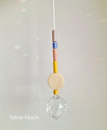 Orvokki Suncatcher | verschiedene Farben Aufgeweckt