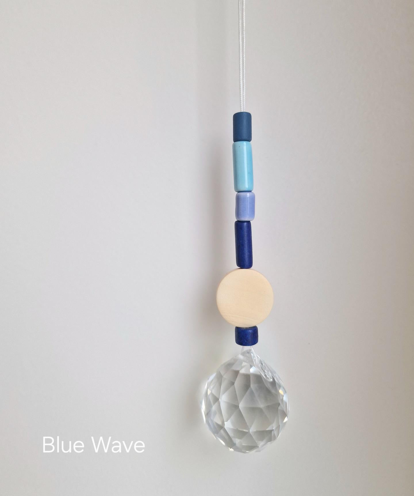 Orvokki Suncatcher | verschiedene Farben Aufgeweckt