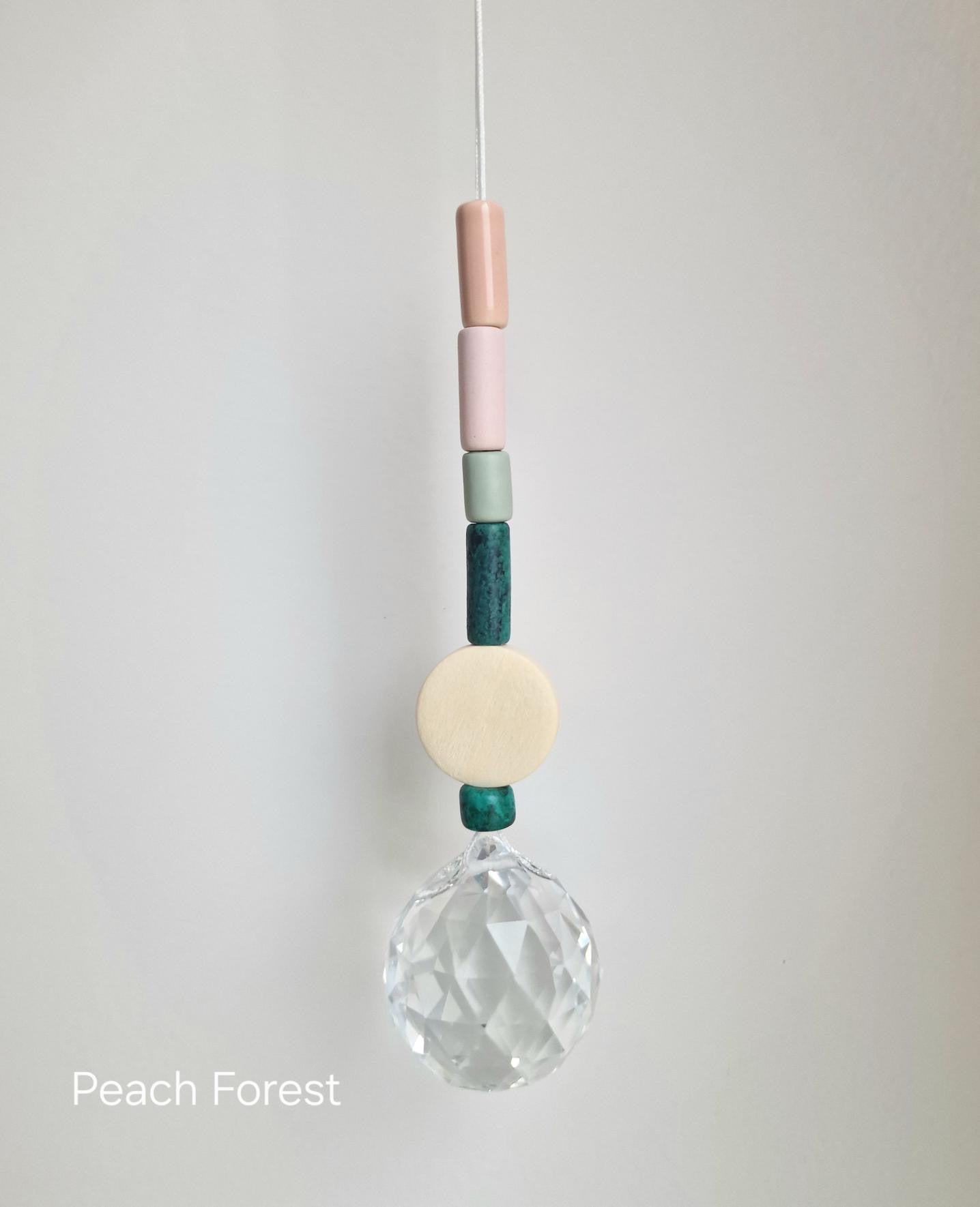 Orvokki Suncatcher | verschiedene Farben Aufgeweckt