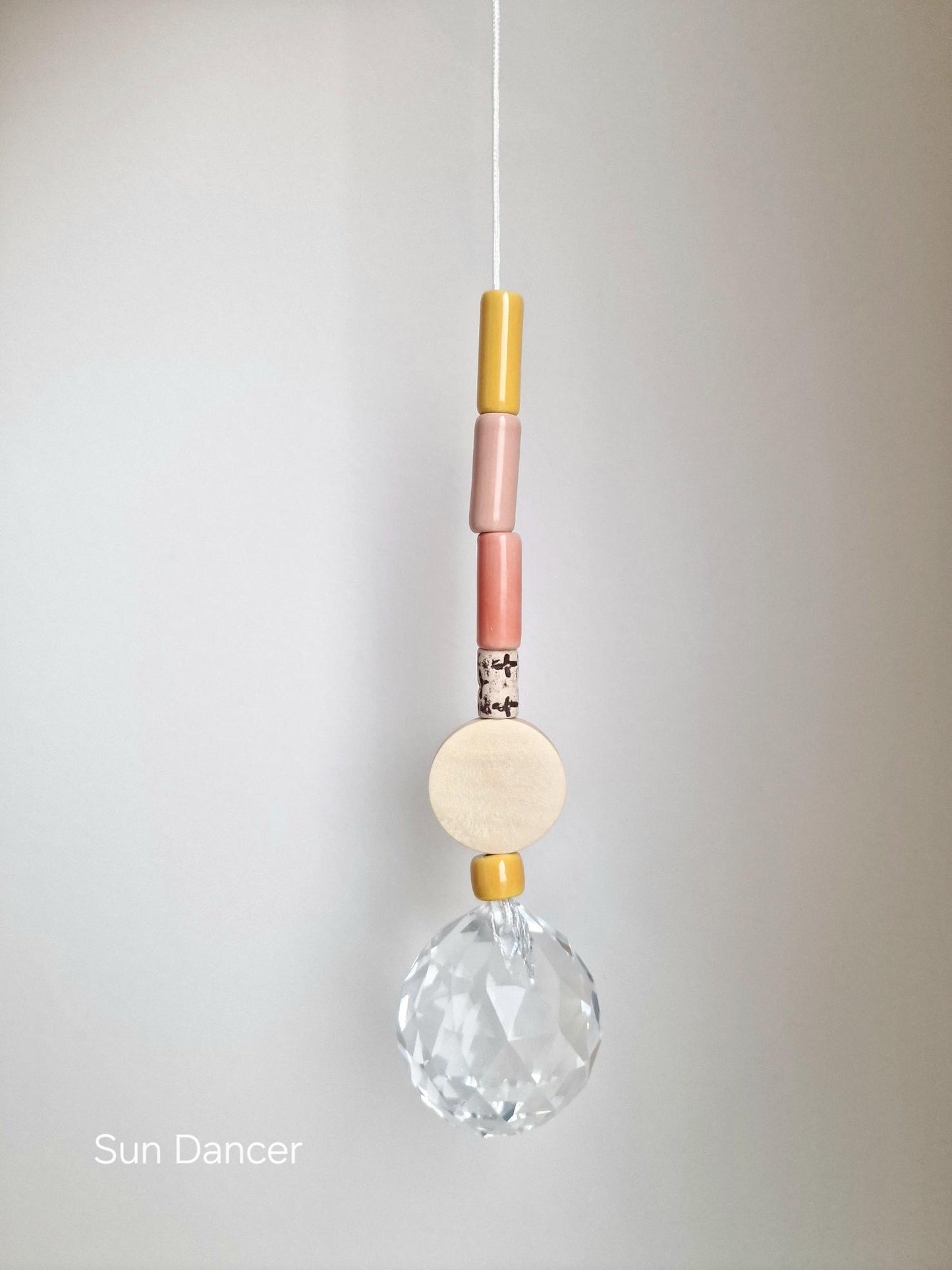 Orvokki Suncatcher | verschiedene Farben Aufgeweckt