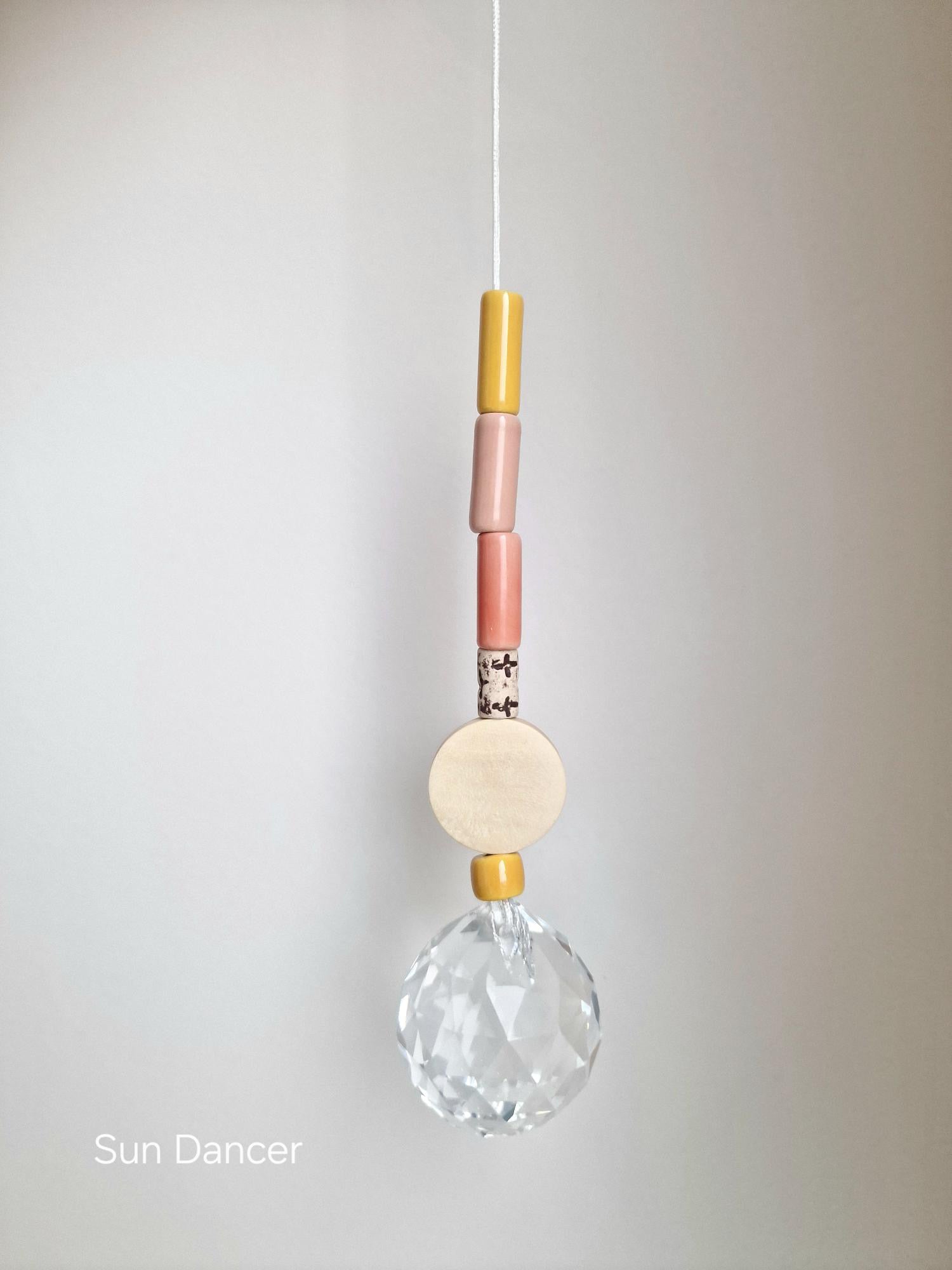 Orvokki Suncatcher | verschiedene Farben Aufgeweckt