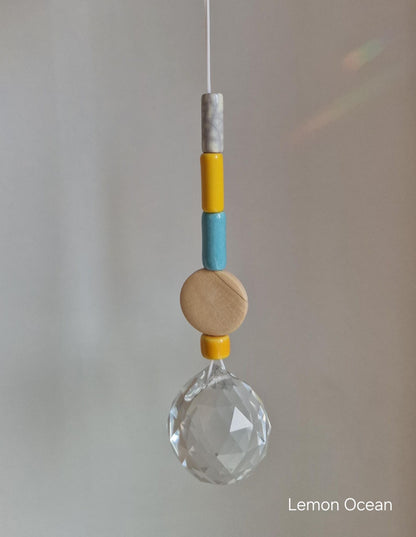 Orvokki Suncatcher | verschiedene Farben Aufgeweckt