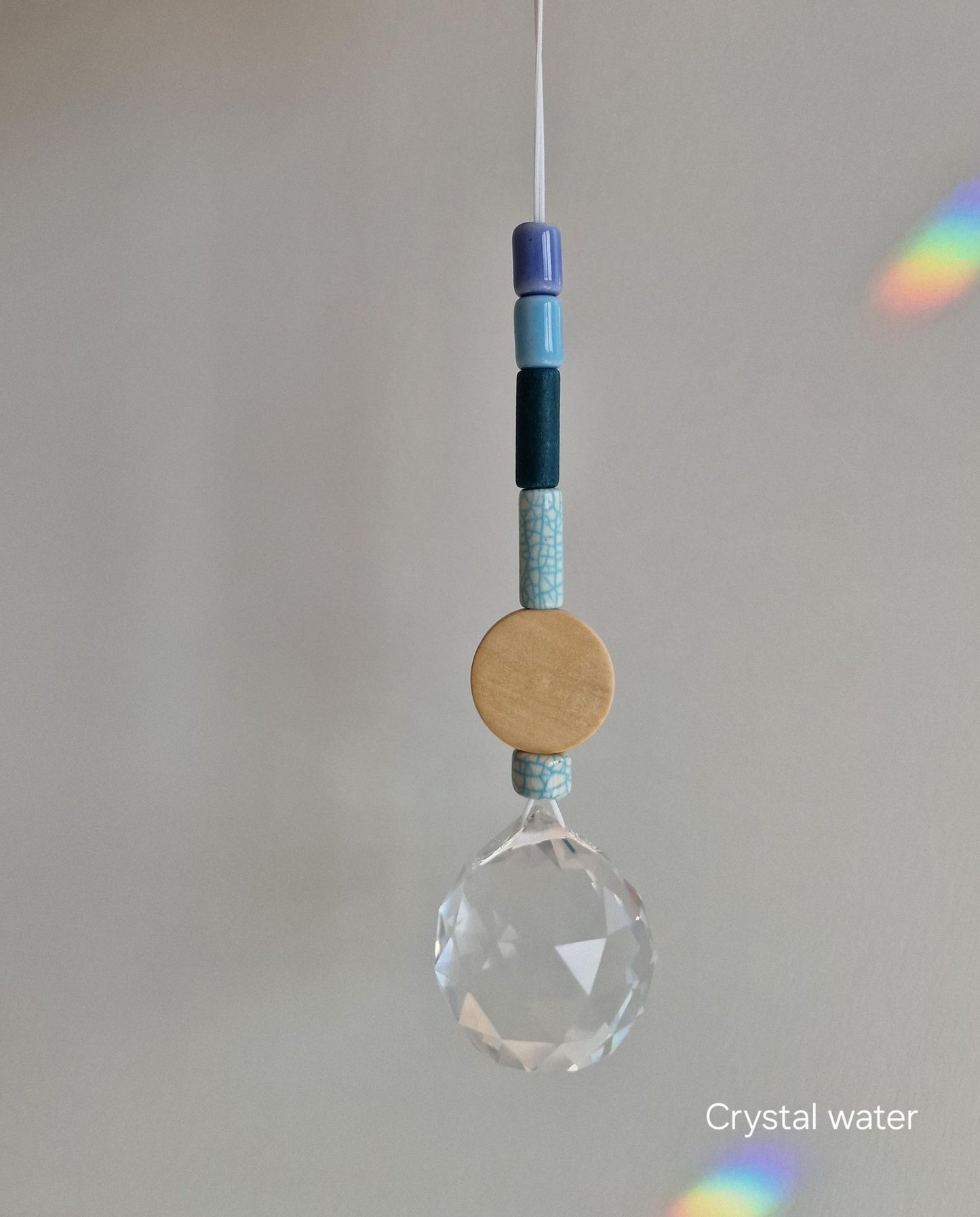 Orvokki Suncatcher | verschiedene Farben Aufgeweckt